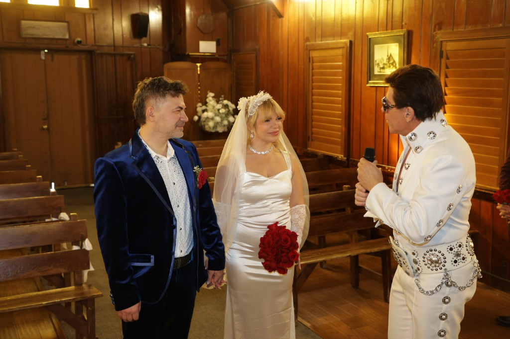 Wedding ceremony in chapel with Elvis officiant